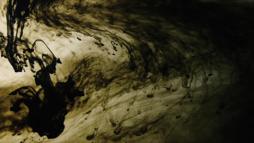 Dark liquid swirls around