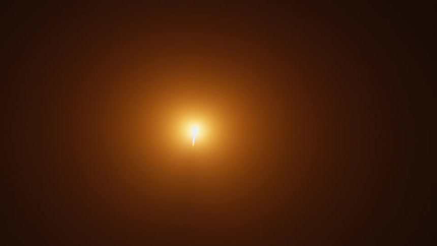An orange glow fades as the light moves into the distance