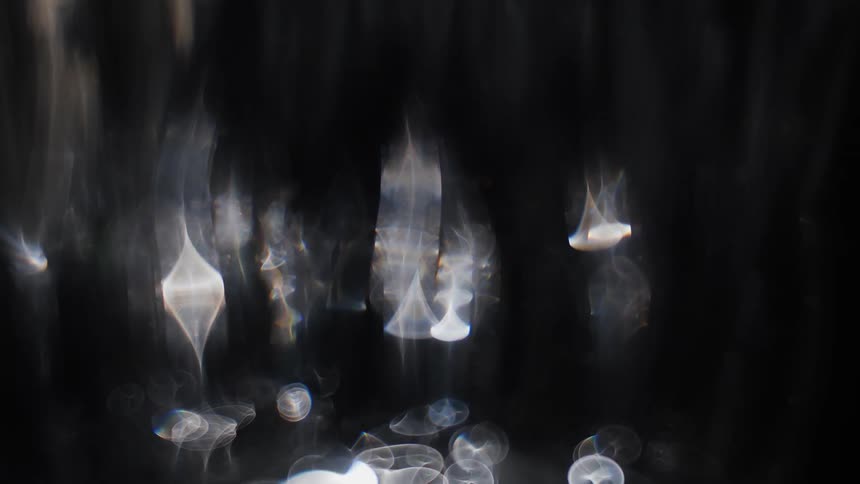 Floating glowing orbs of light