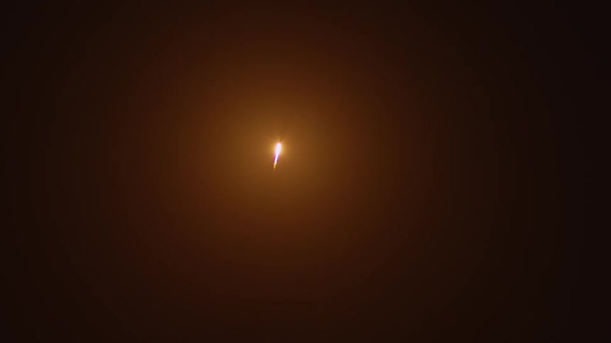 A bright light glowing in darkness