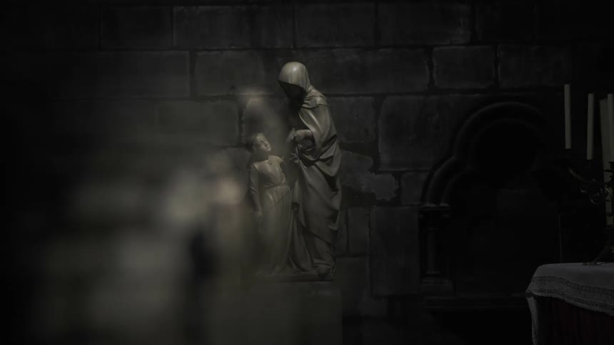 A statue of a woman and child