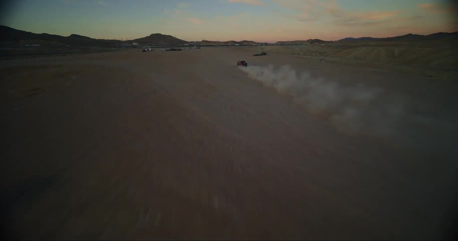 FPV - Wide shot chasing baja truck in desert