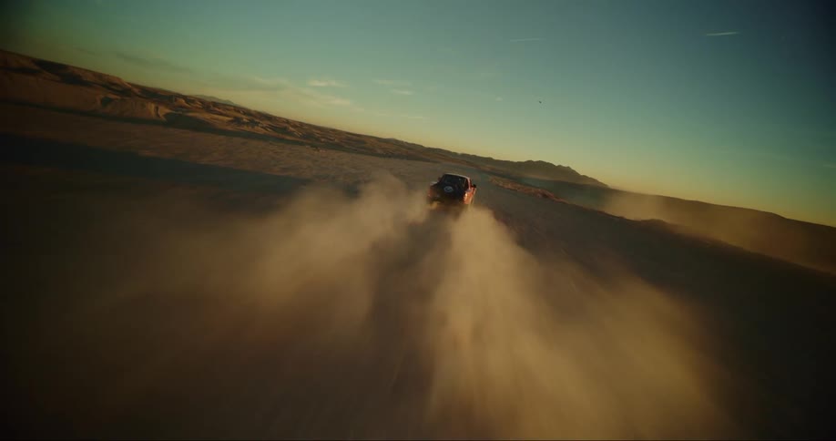 FPV - Low flying in the dust wake of a baja truck at sunset