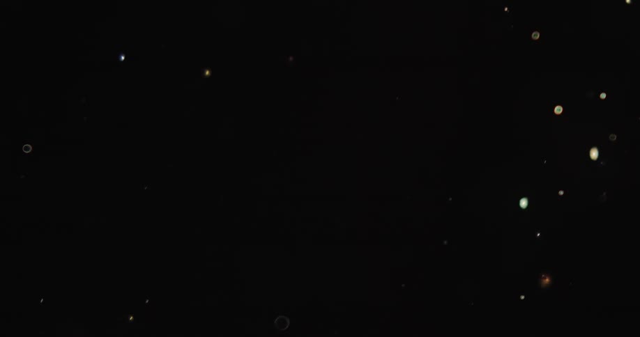 A computer animation mimics twinkling lights in the dark sky