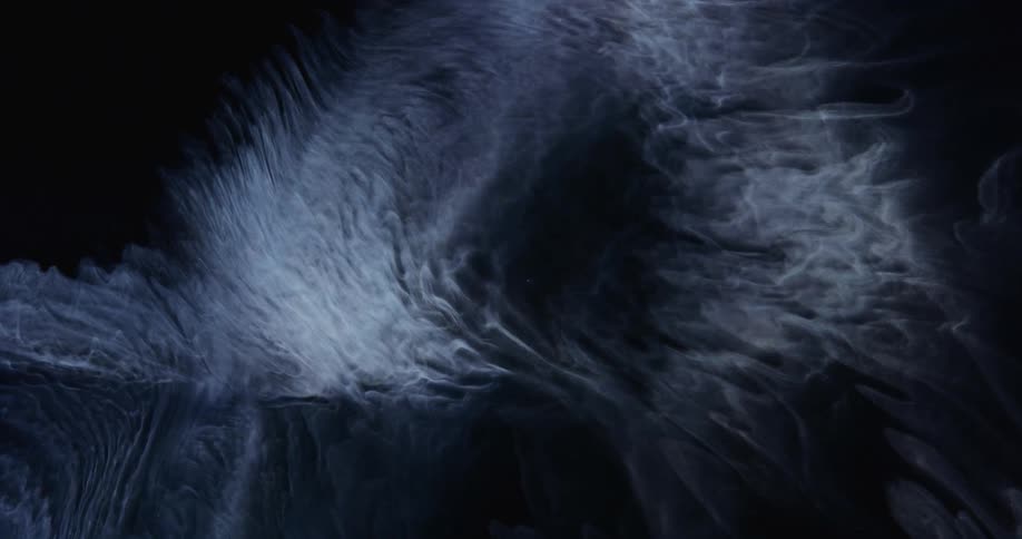 Heavy smoke fills a pitch black room
