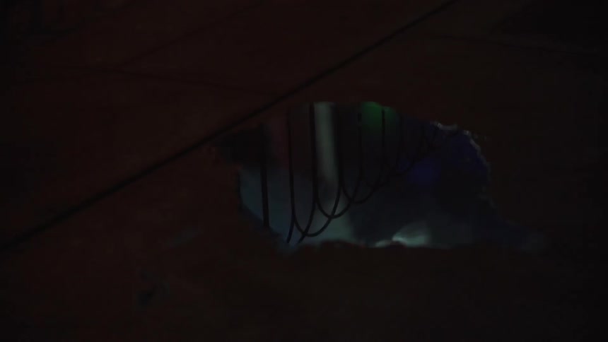 Lights are reflected in a puddle