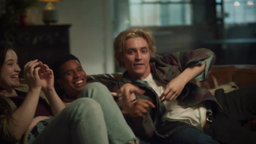 Two men fight over dice then friend comforts loser after winner moves piece