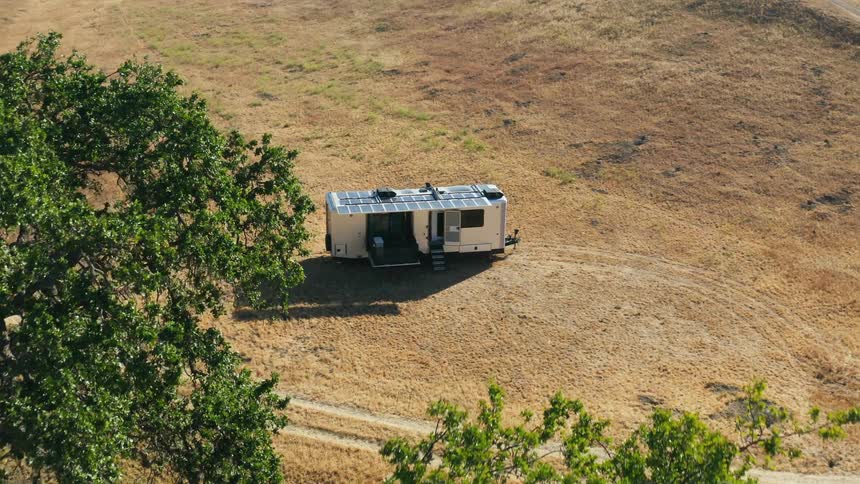 Aerial view of mobile home in the field