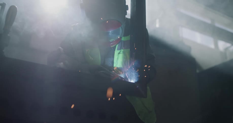 A man is welding in the factory