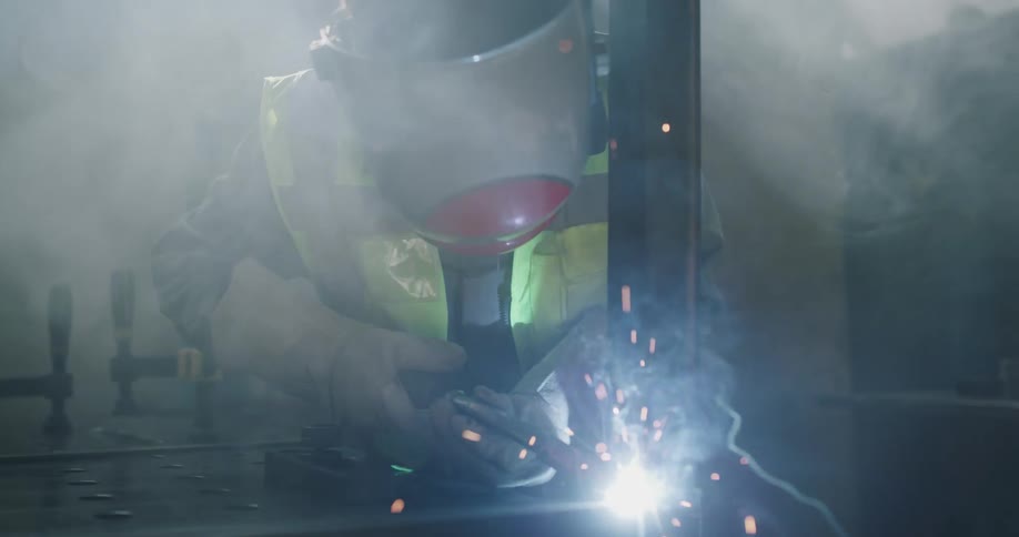 A welder welding construct together