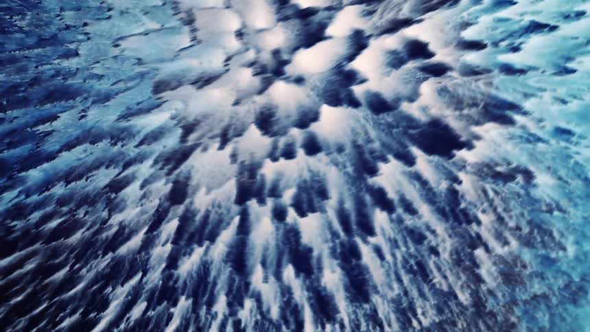 Wave shifting blue foliciles left to right