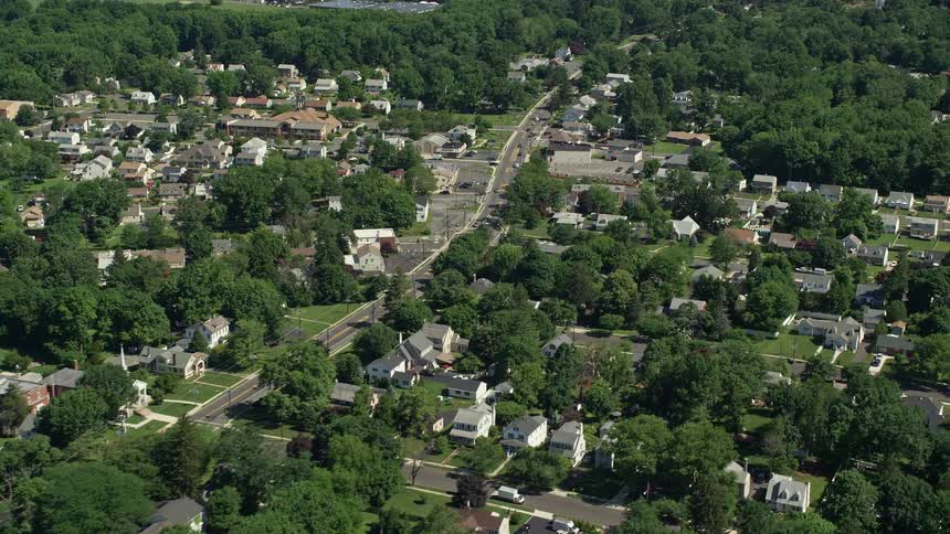 Soaring above an idyllic suburban community in Lawrence Township this aerial footage captures the peaceful quiet of a beautiful day in New Jersey