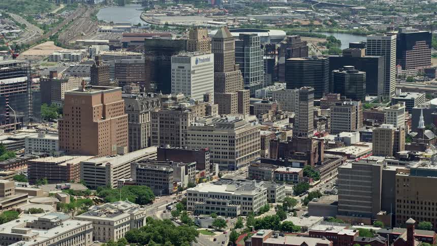 A stunning aerial view of Downtown Newarks high-rises and skyscrapers on a sunny day showcasing the metropolis of New Jerseys East Coast