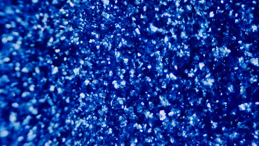 The blue rocks fall into the pile