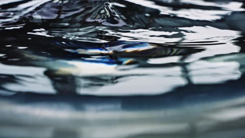The rippling surface of flowing water