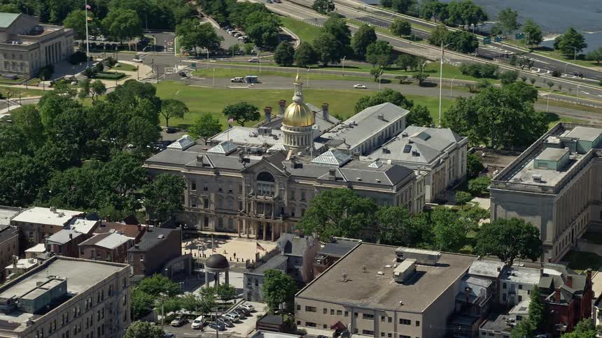 Aerial footage of the New Jersey State House in Trenton NJ on a sunny summer day