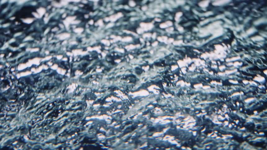 Bubbling and flowing water in light