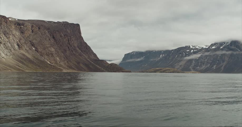 On a boat in the Arctic Ocean moving towards Ayuittuq National Park on Baffin Island