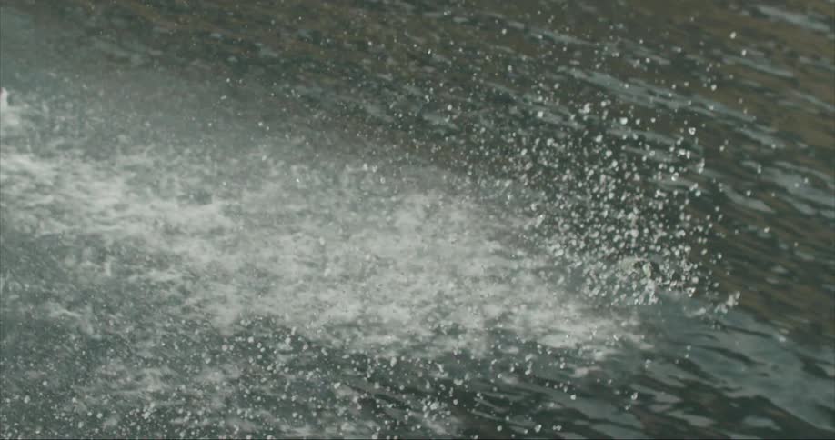 Slow motion boat wake shot as the expedition moves towards their start point