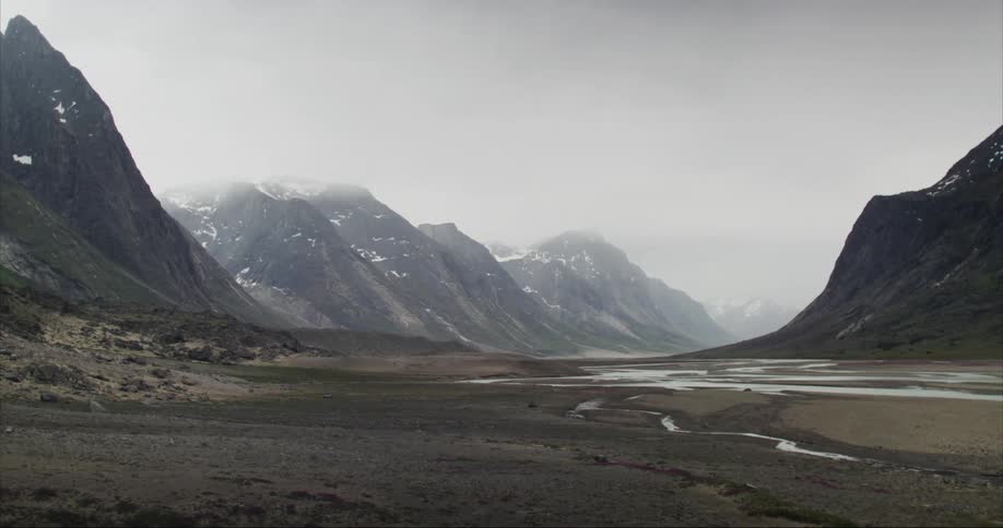 Landscape of glacial river valley on stormy and windy day