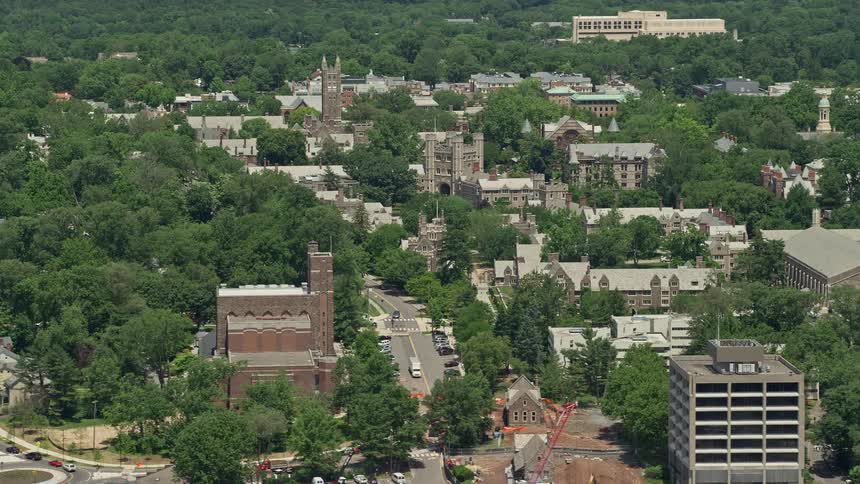 Aerial footage of Mathey College and Blair Arch at Princeton University New Jersey on a sunny day