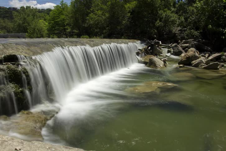 A waterfall in a small river in the forest