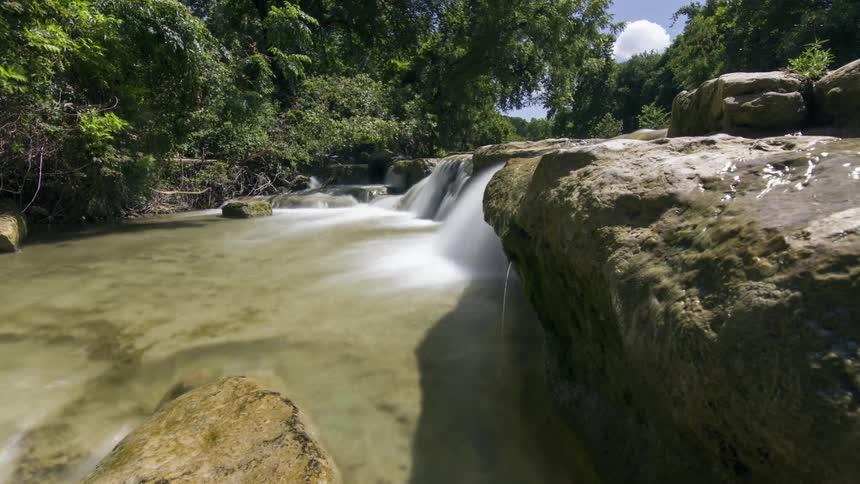 Water spilling into a small creek