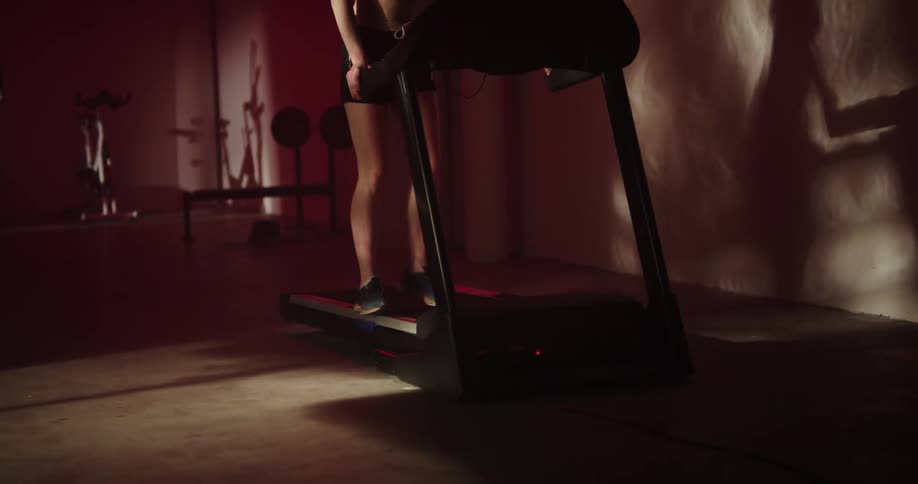 A woman running on a treadmill