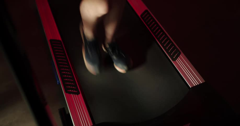 A person is walking on the treadmill