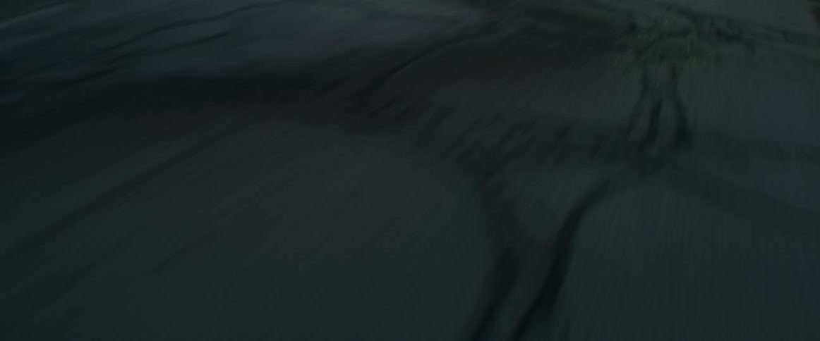 Vehicle drives on highway with cracks
