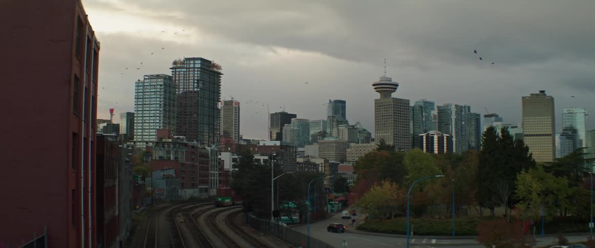 Elevated view of railways and high rise buildings in Vancouver on a cloudy day