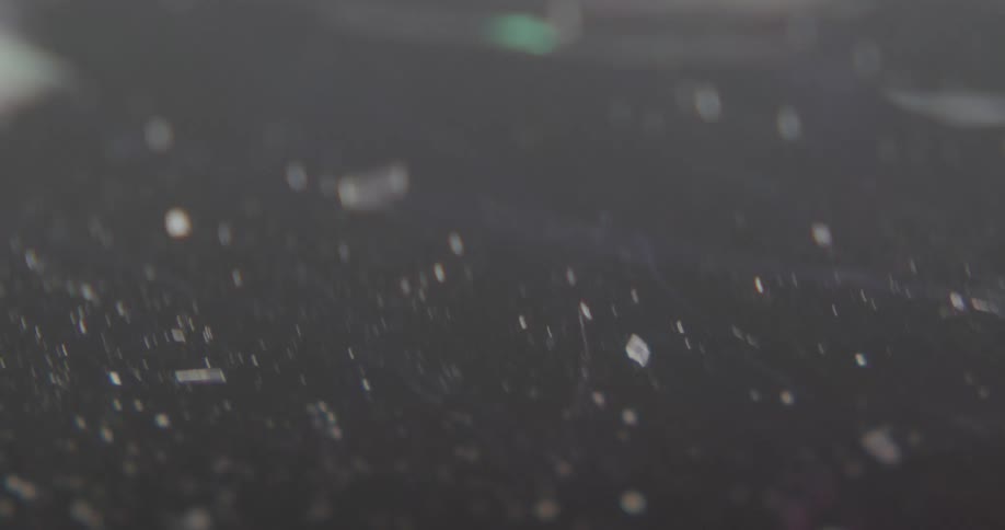 Red flashing lights on shattered glass on the cement
