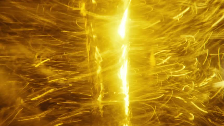 A twister turns in an electric yellow environment as sparks rapidly spin around the vortex