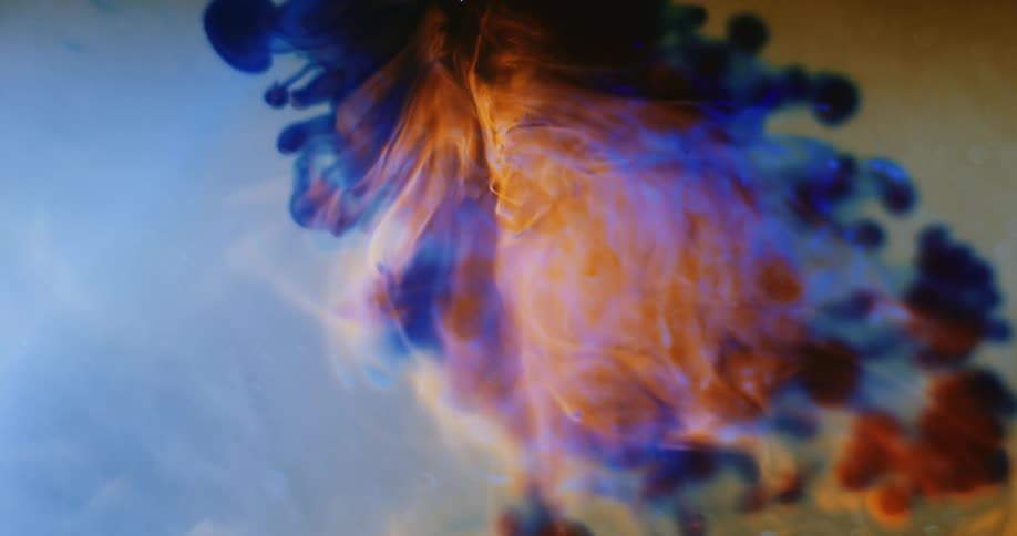 Vapors rising up in a orange and blue hue