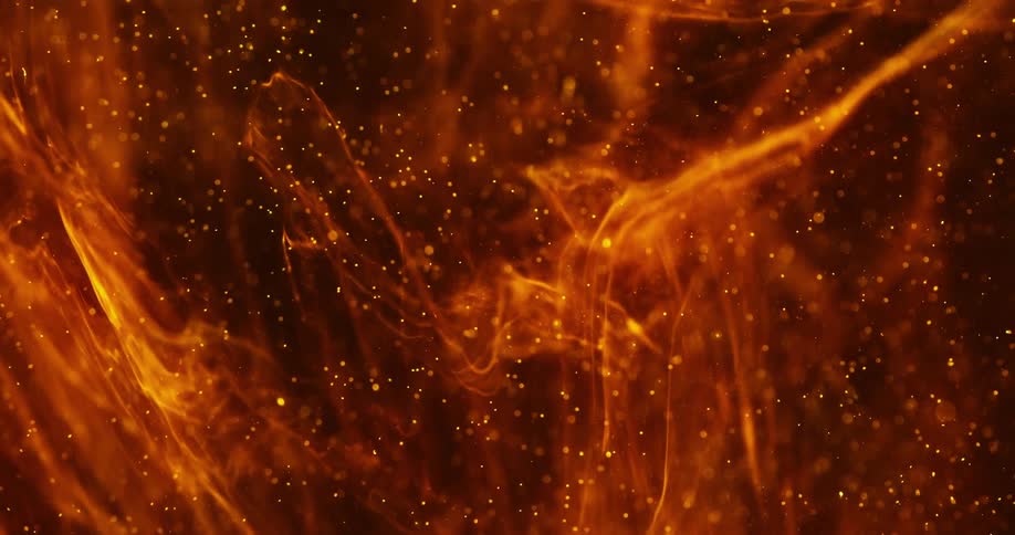 Orange particles rise up with vapors