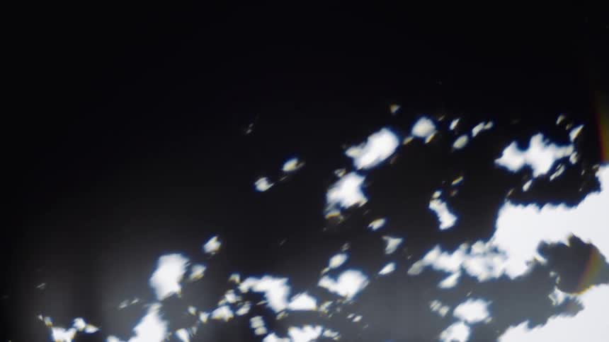 The black debris breaks apart
