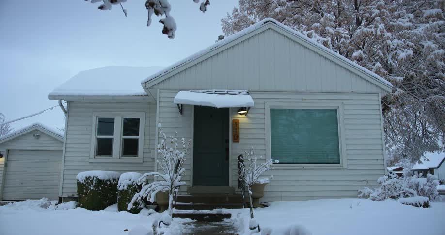 A view of snow on a home outdoors