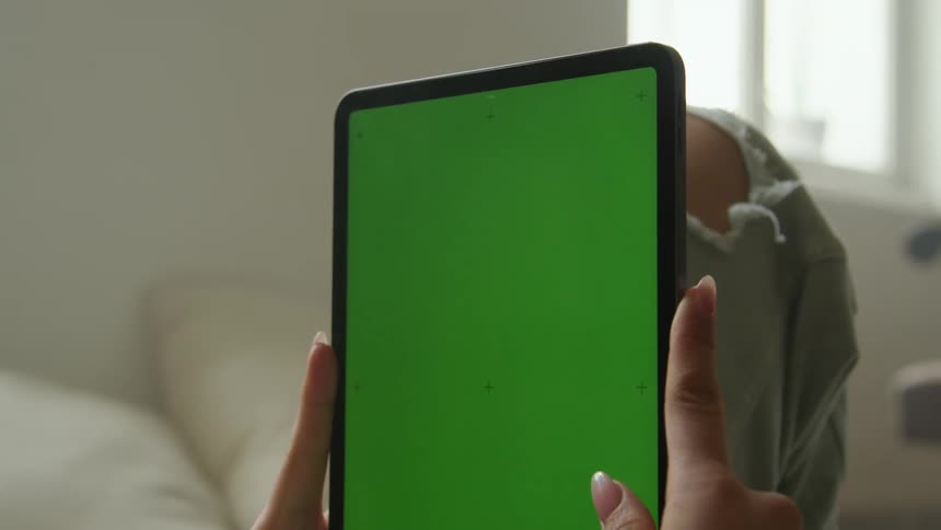 A person using a tablet computer