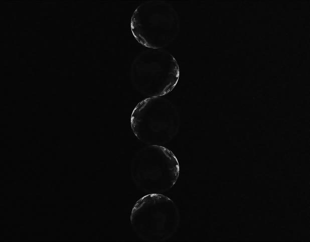 A white line moves in a spiral against a black background