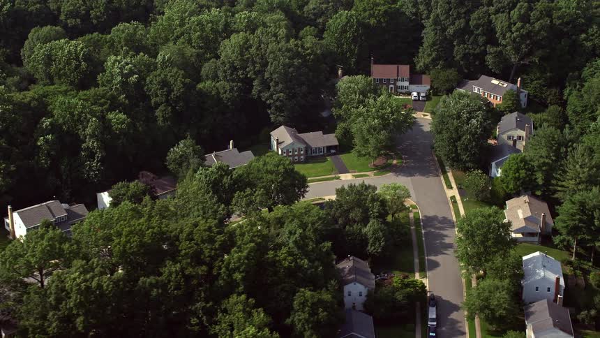 A breathtaking aerial footage of spacious homes in a suburban neighborhood of Annandale Virginia during a sunny day