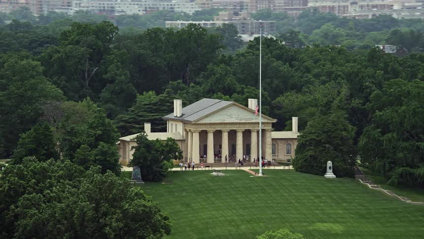 Tour groups visiting Arlington House a landmark building in Arlington National Cemetery captured in aerial footage during a summer day