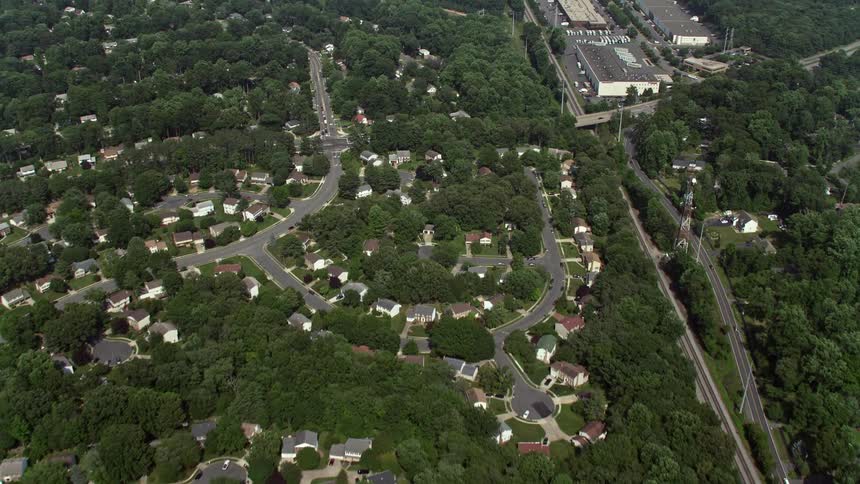 Get a unique birds eye perspective of suburban life as aerial footage showcases Burke VAs streets and homes during summertime