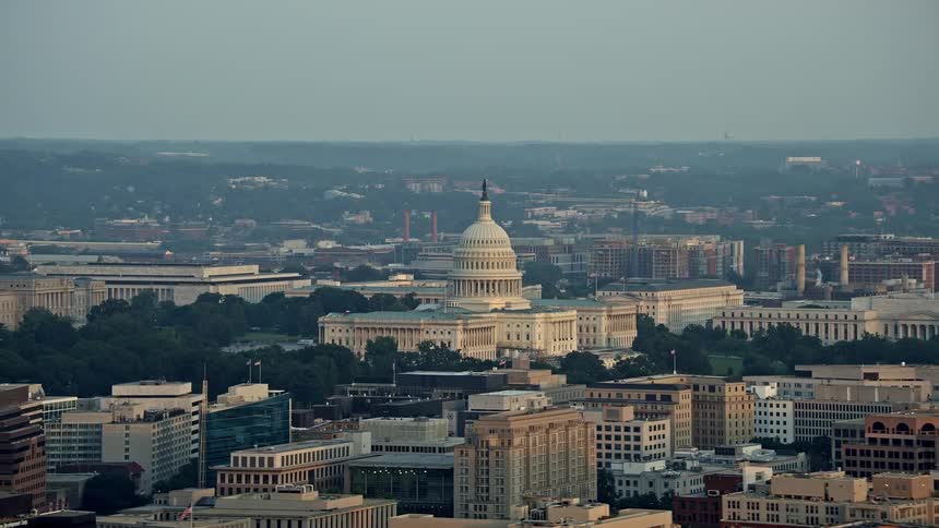 An aerial view of the United States Capitol during sunset in Washington DC