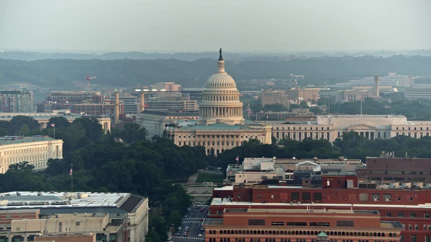 A stunning aerial view at sunset of Russell Senate Office Building and the United States Capitol in Washington DC