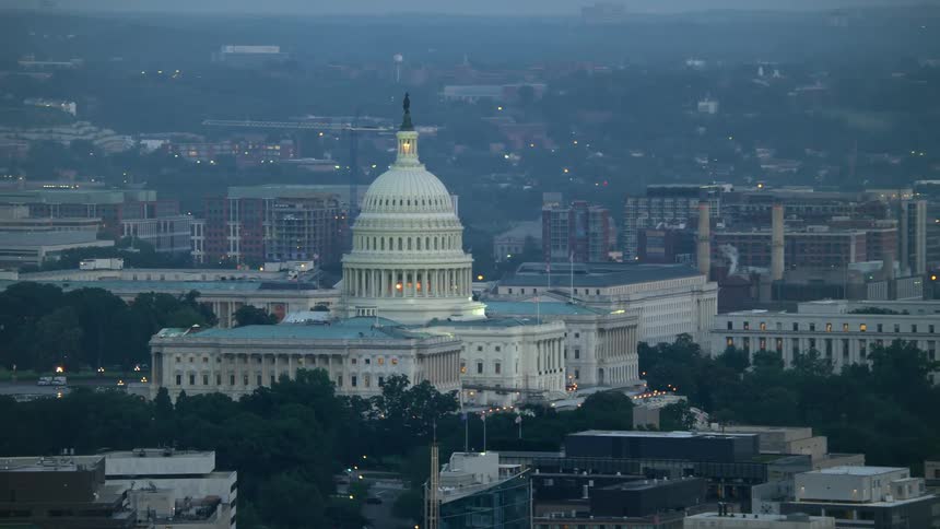 Aerial footage captures the iconic landmark of the United States Capitol in Washington DC during twilight