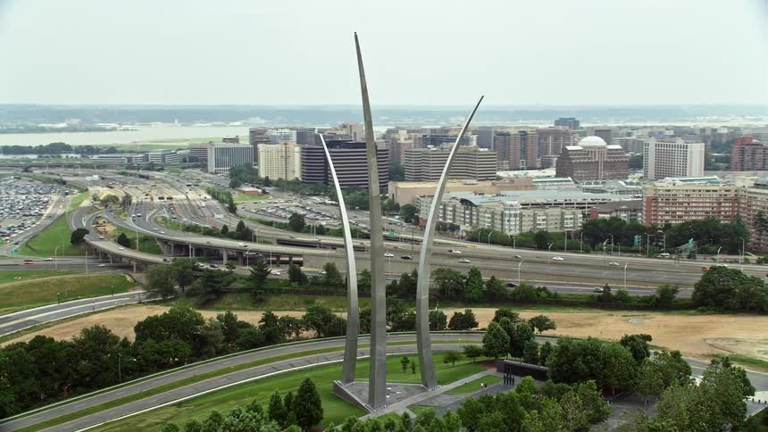 This clip features aerial footage orbiting the United States Air Force Memorial before revealing The Pentagon in Washington DC showcasing a famous government building and historic landmark