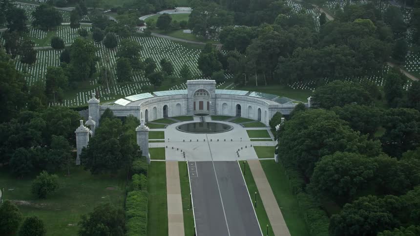 Aerial footage of Women in Military Service for America Memorial at Arlington National Cemetery during twilight in Virginia