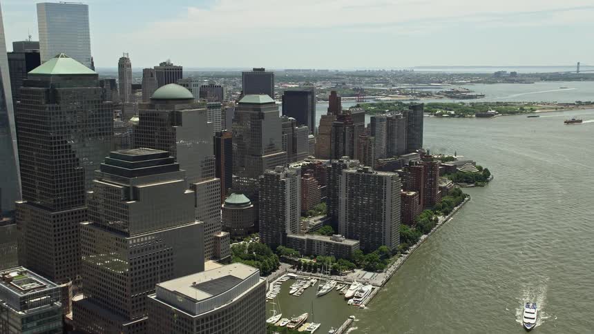Aerial footage showing the World Trade Center skyscrapers in Lower Manhattan New York City on a sunny day