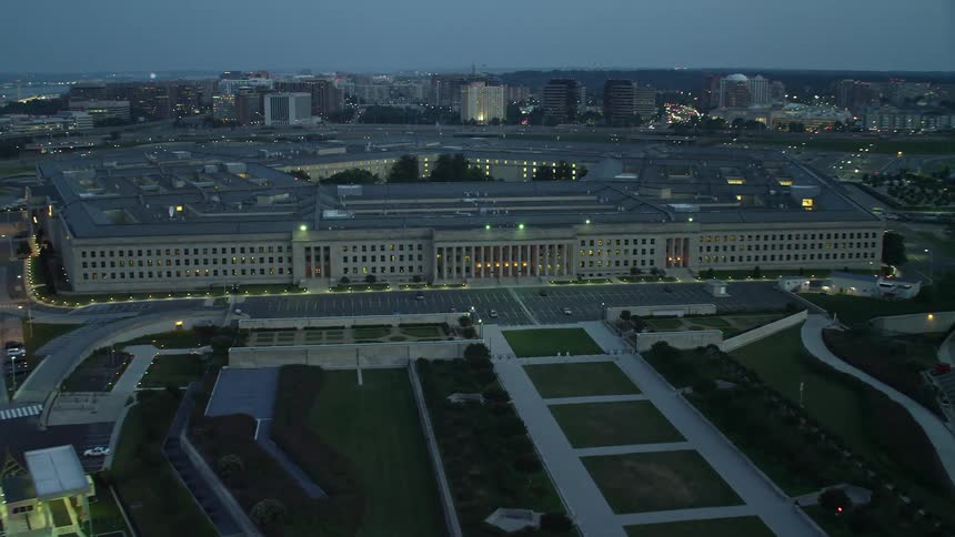 Approaching The Pentagon building at night this aerial footage showcases one of Washington DCs iconic structures