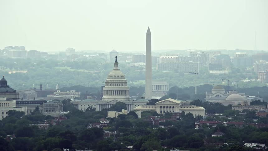 Aerial view of Washington Monument Library of Congress buildings and United States Capitol Dome in Washington DC during summer